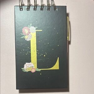 Green and Yellow Spiral Notebook with Floral Design